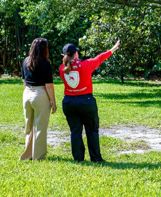 Woman and Moshield Backyard Logo