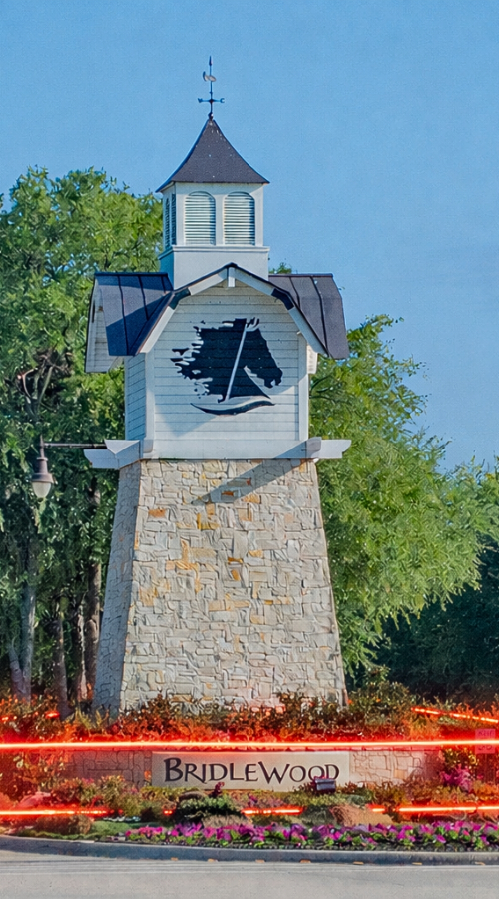 Bridlewood Town sign with barrier