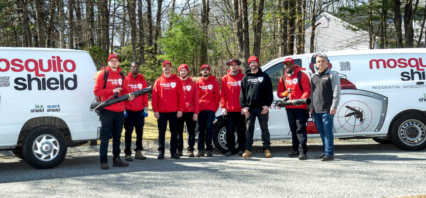 North Attleboro in front of their vans